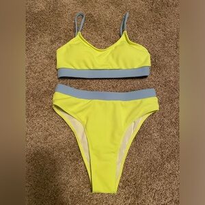 Small neon yellow bathing suit. Never worn